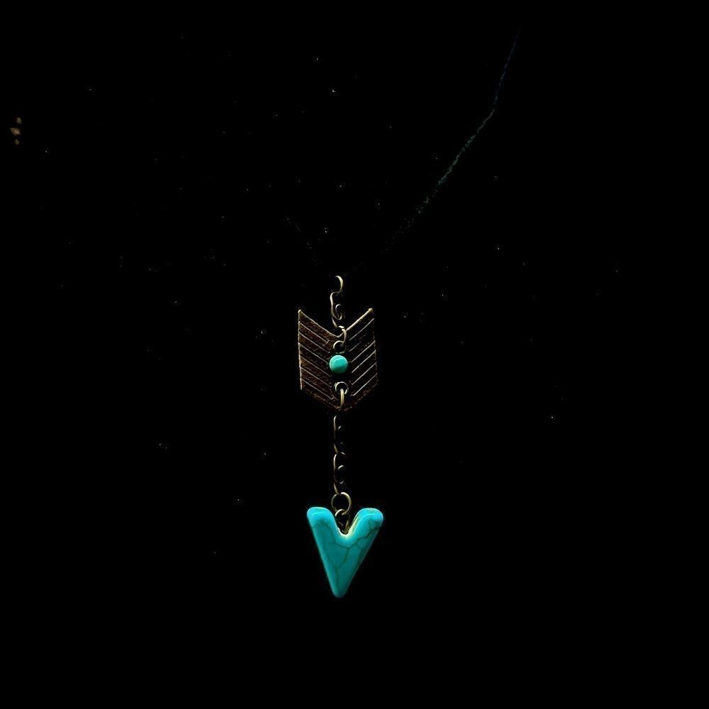 Arrow with black necklace